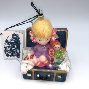 Girl in suitcase